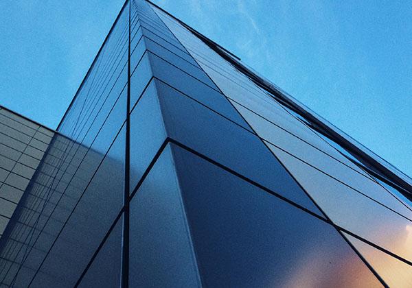 High rise building with a blue sky background